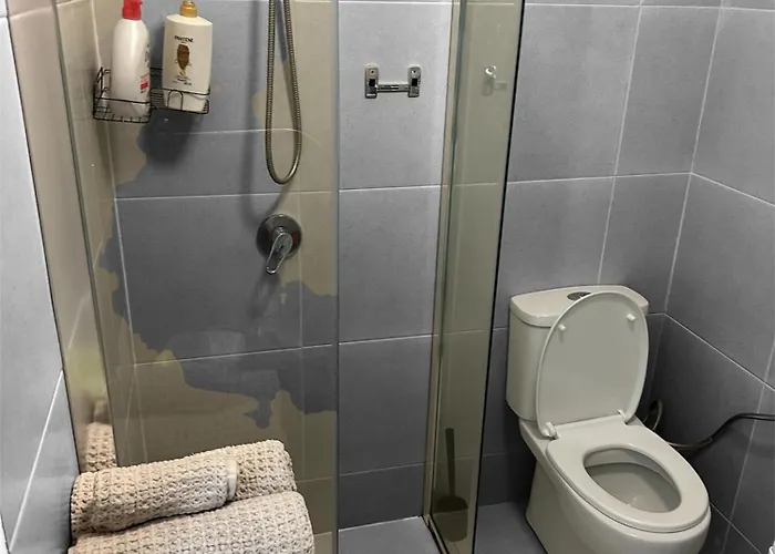 Studio med en queensize-seng